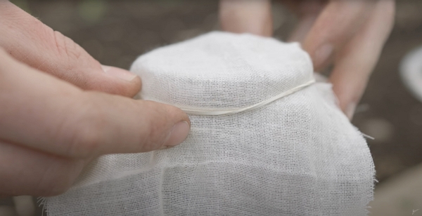 A cotton fabric to cover the jar