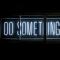 A neon sign displaying “Do Something Great”