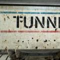 “Tunnel” written on a metal structure