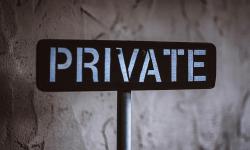 A sign post with the word "Private"