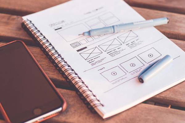 A notebook with wireframes