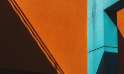 A building with orange and blue parts